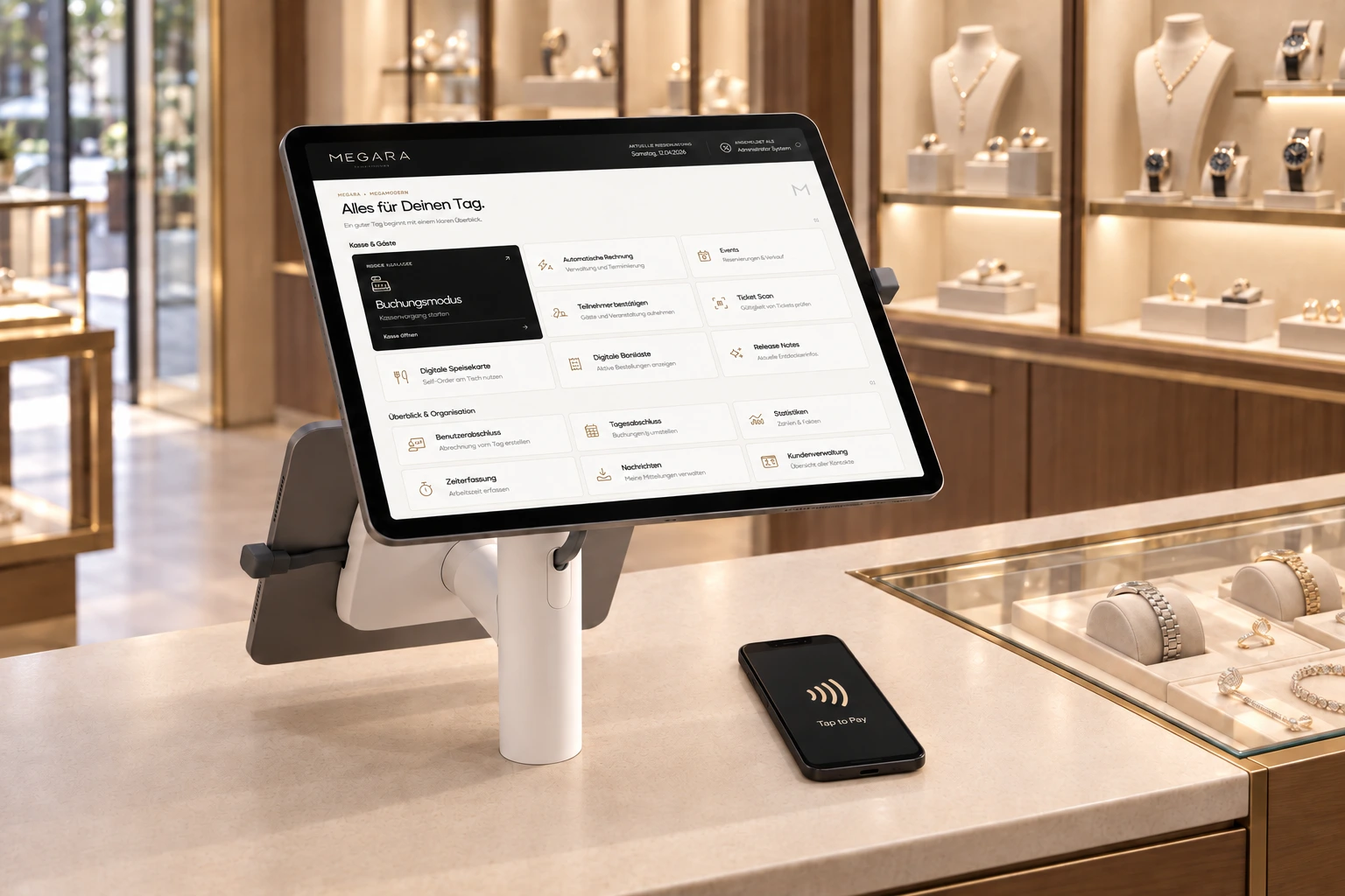 Megara-Kassenoberfläche auf weißer Doppelhalterung an einer Schmuck-Verkaufstheke, mit Kundendisplay von hinten, schlankem Tap-to-Pay-Handy und zum Kunden ausgerichteten Uhren unter Glas
